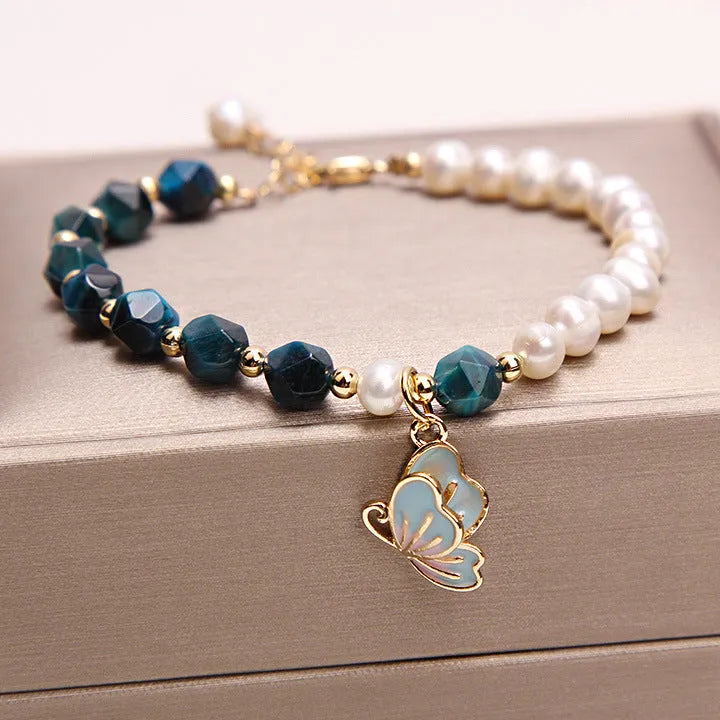 Vv- Immigration to the United States in 1800s: European Heritage Preserved Through Traditional Tigereye Pearl Braided Artistry - vannveld