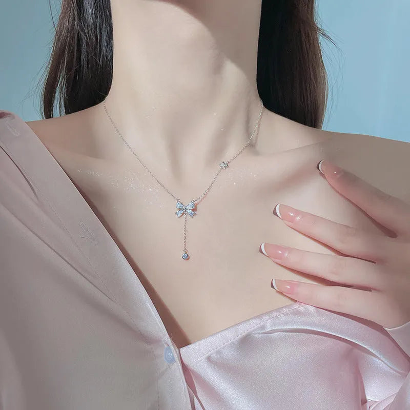 Vv- Modern Era Collection: Minimalist American Design Sterling Silver Cascade Bow Necklace - vannveld