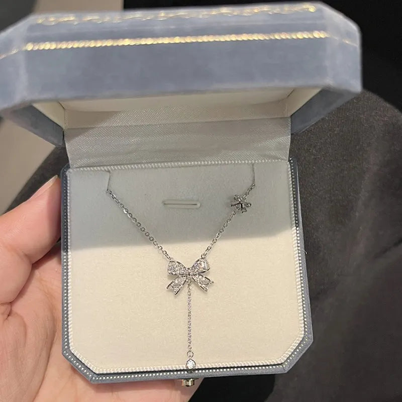 Vv- Modern Era Collection: Minimalist American Design Sterling Silver Cascade Bow Necklace - vannveld