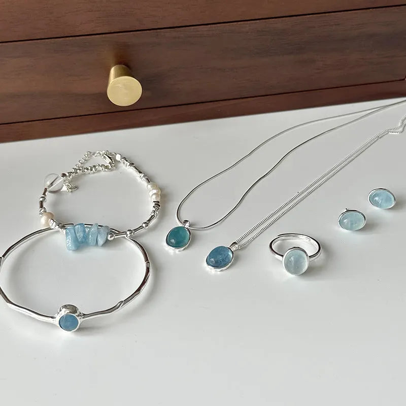 Vv- Space Age Collection: Mercury Mission-Inspired Aquamarine Silver Earth-View Celestial Jewelry Set - vannveld