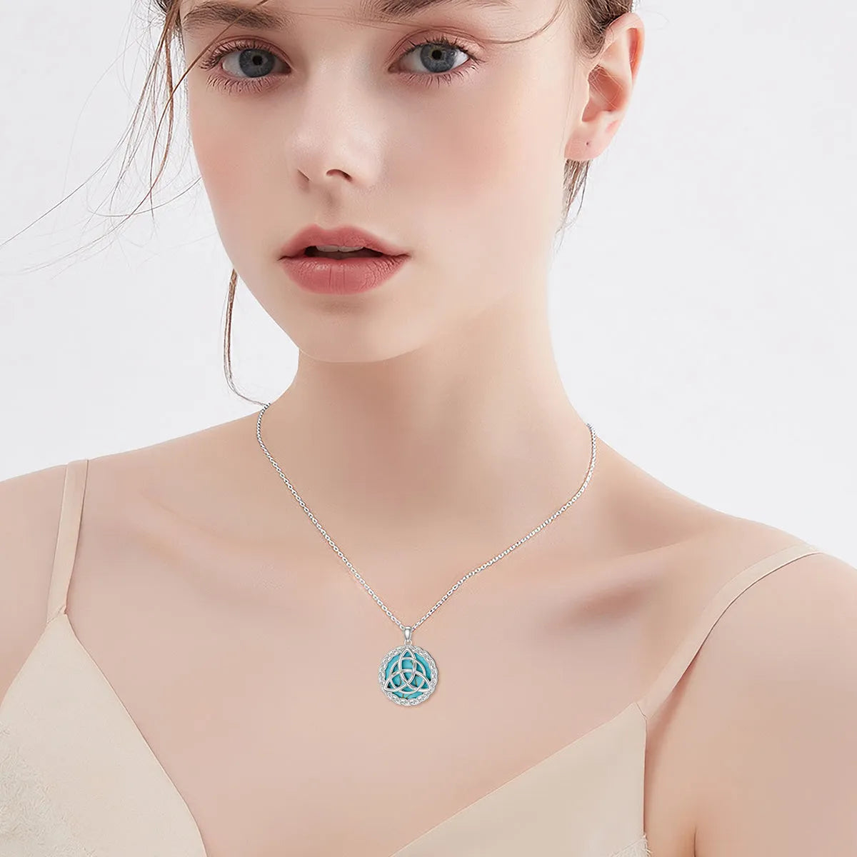 Vv- Union and Emancipation Collection: Turquoise Trinity Knot Necklace - Unveiling Freedom's Legacy in Sterling Silver - vannveld